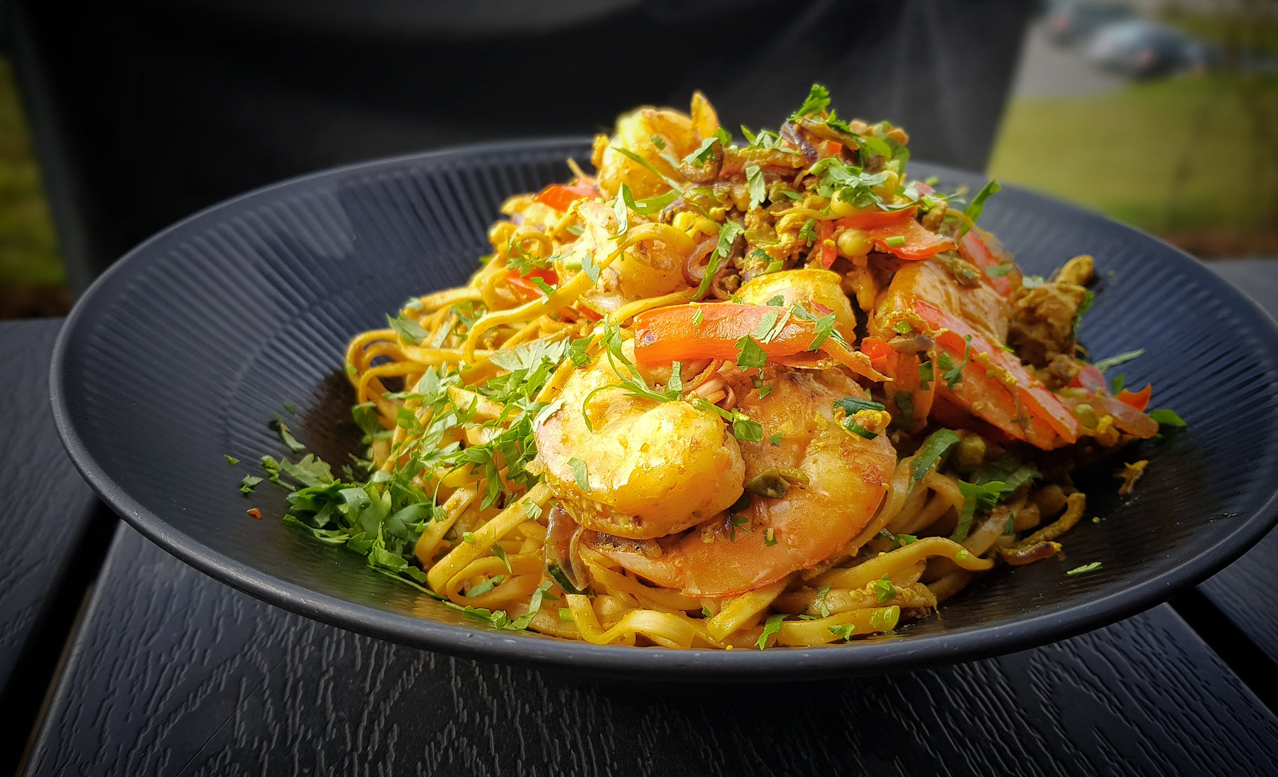 Noodles with tiger prawns made by HOT WOK